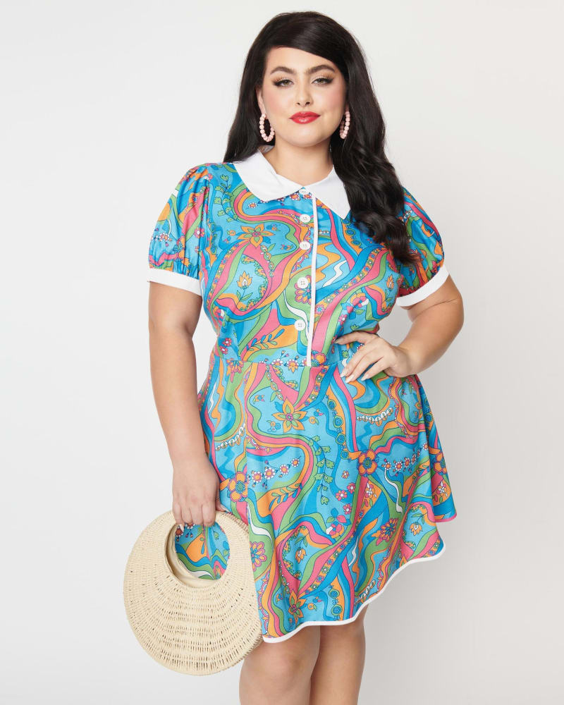 Front of a model wearing a size L Smak Parlour Psychedelic Floral River Fit & Flare Dress in Blue, Floral, Rainbow by Smak Parlour. | dia_product_style_image_id:287302